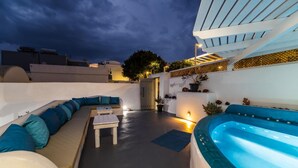 A rooftop terrace with a pool, seating area, and a door leading to the interior. - Casa Maritina Private Villa With Jacuzzi (Santorini)