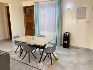 Deluxe Apartment | Dining room - Krish Plaza Apartments (Mombasa)