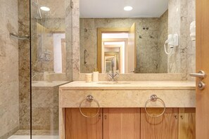 Bathtub, hair dryer, towels