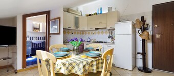 Holiday Apartment "Mansarda Di Ponente" near Beach with Shared Garden & A/C