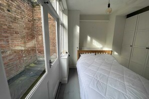 1 غرفة نوم وملاءات أسرّة