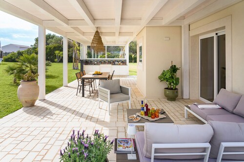 Luxury villa with pool, beach front, Porto Ulisse