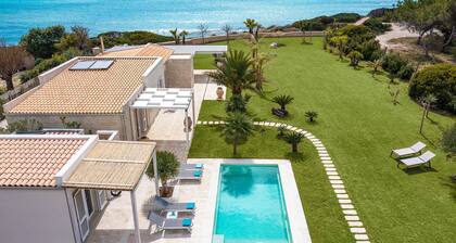 Luxury villa with pool, beach front, Porto Ulisse