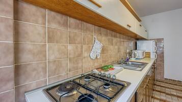 Family Apartment, Multiple Bedrooms (Green Hill Zagreb - Apartment Zen) | Private kitchen | Fridge, oven, stovetop, cookware/dishes/utensils