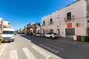 A street with parked cars and a white IVECO truck. - 3267 Casa Romantica by Barbarhouse (Sava)