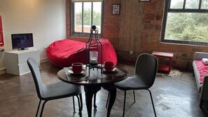 25-inch flat-screen TV with digital channels, TV, streaming services - Artistico-Styled Studio Loft Sleeps 5 (Dallas)