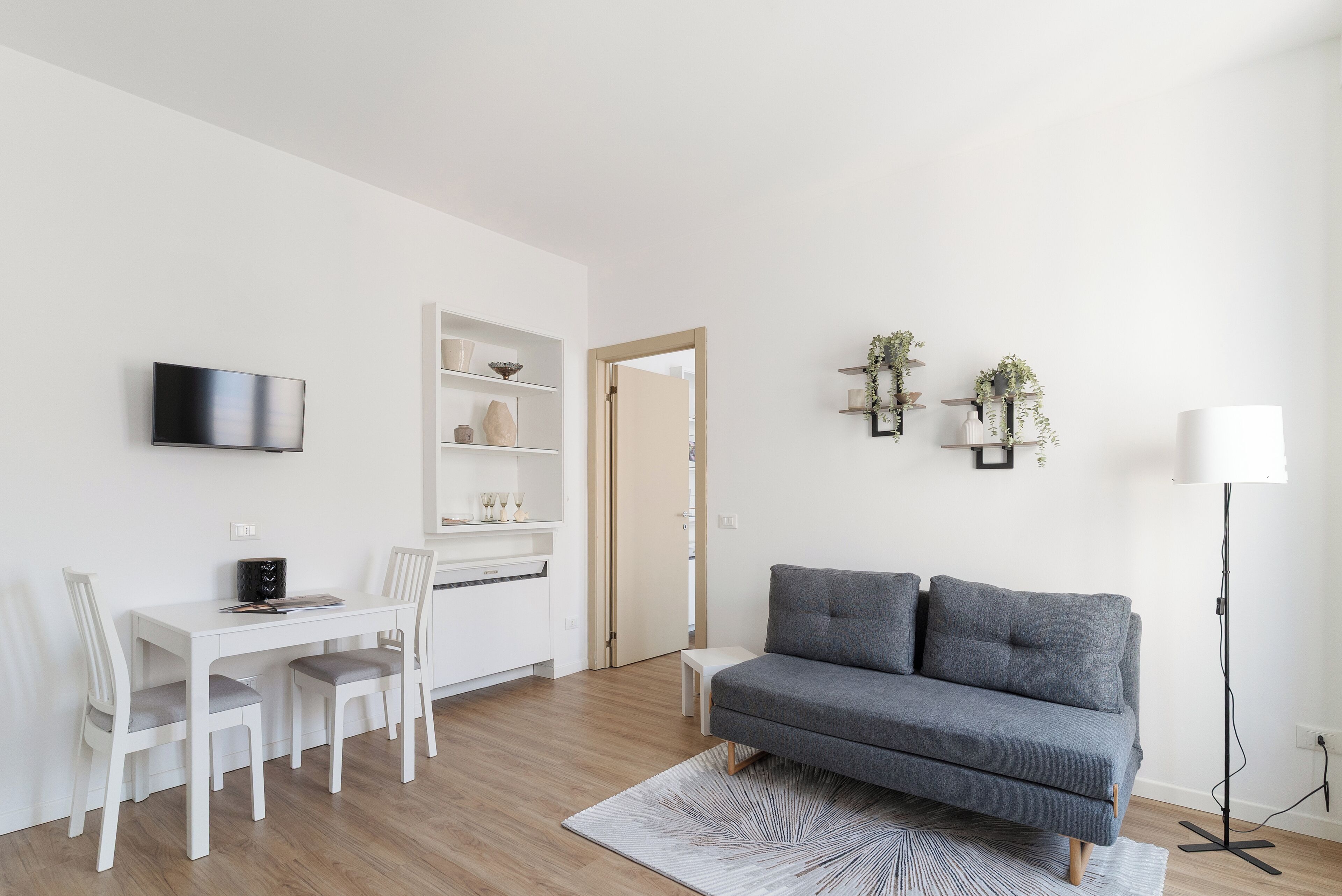 Appartamento con 1 Camera da Letto  Via della Spiga 46 | Living area | 40-inch flat-screen TV with satellite channels, TV