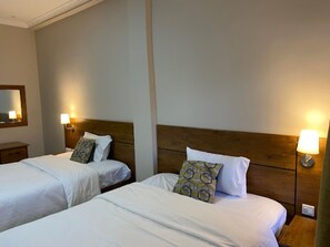 Habitación Deluxe con 1 cama doble o 2 individuales | Wifi gratis y ropa de cama