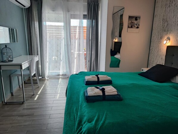 1 chambre, fer et planche à repasser, Wi-Fi gratuit, draps fournis