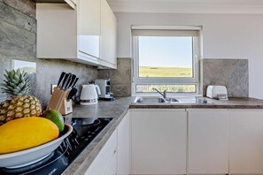 Unclassified image, 2 of 26, button