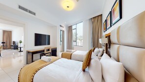 A hotel room with two beds, a desk, a TV, and large windows. - GreenFuture - Capital Bay Tower A (Dubai)