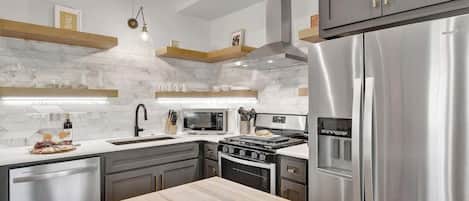 Coffee/tea maker, fridge, microwave, oven
