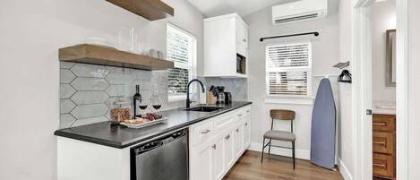 Fridge, microwave, coffee/tea maker, toaster