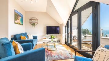 Apartemen Mewah | Area keluarga | Televisi LED 50-inci dengan saluran TV kabel, TV, dan Netflix