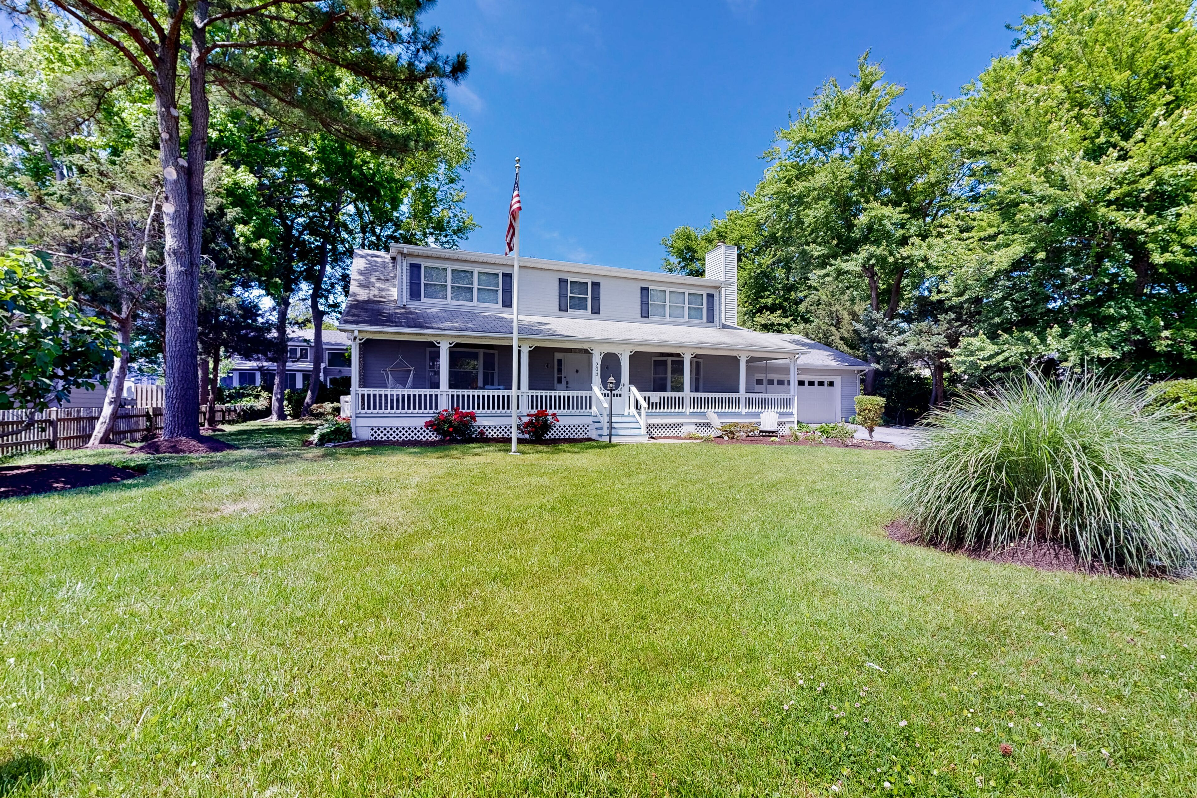 Dog-friendly Sea-Breeze home with screened porch, fireplace, grill, AC, & W/D