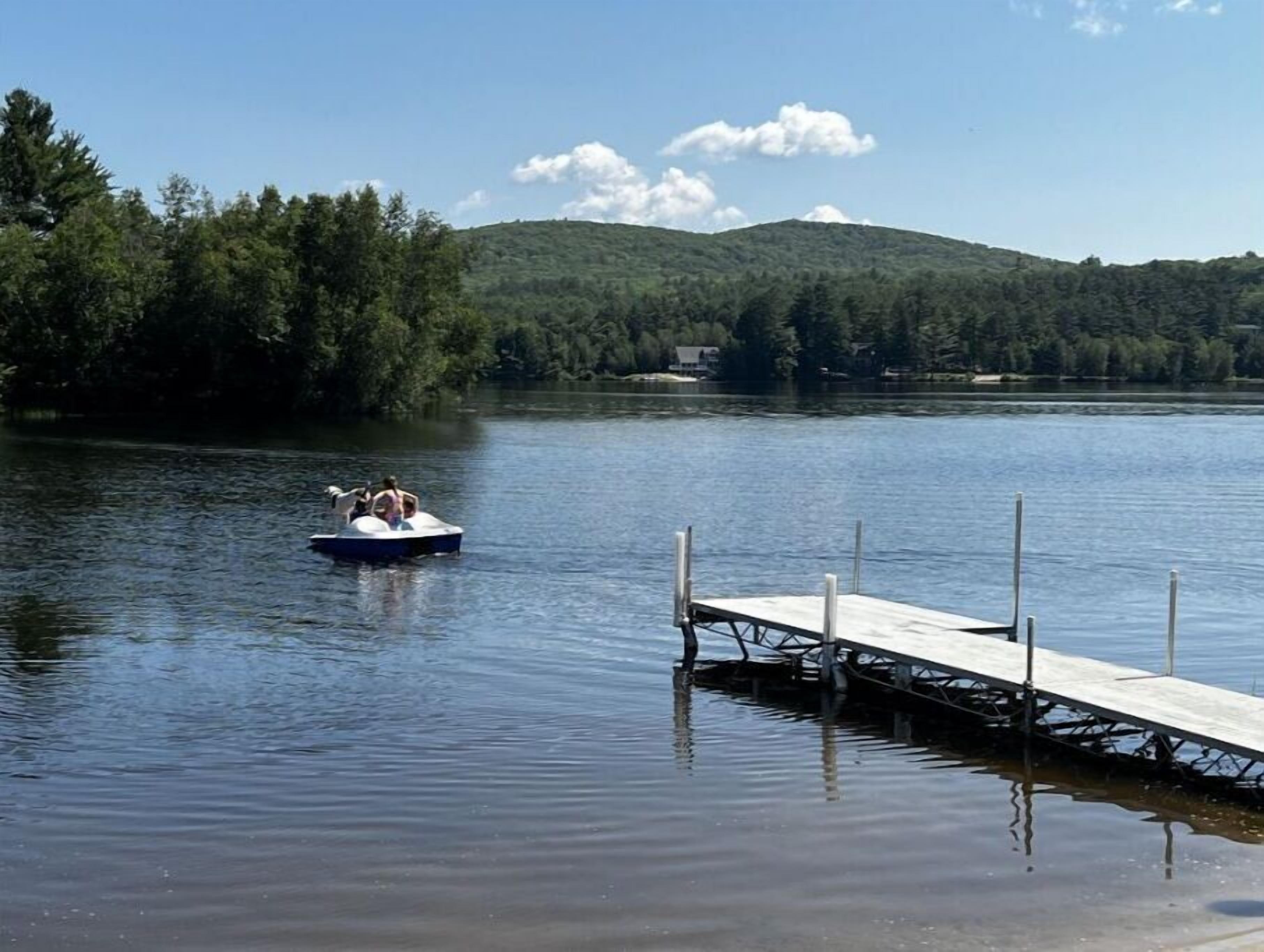 Relaxing Retreat with lakefront living, sandy beach, lots of trails nearby