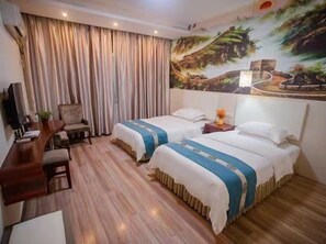 A hotel room with two beds, a desk, a chair, and a large mural on the wall. - Hengyang Wangyuelou Homestay (Mount Heng Scenic Area Nanyue Grand Temple) (Hengyang)
