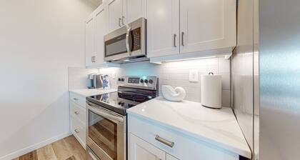 Splendid waterfront downtown condo with Penn Cove views, balcony, W/D, streaming