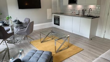 Luxury Penthouse | Living area | 50-inch Smart TV with digital channels, TV, Netflix