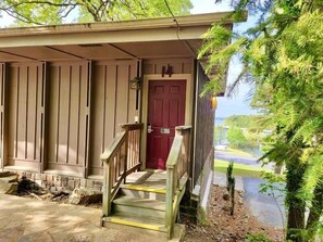 Exterior - Lake view queen guest room with two queens,  sleeper sofa and patio overlooking Lake Ouachita. by RedAwning (Mount Ida)