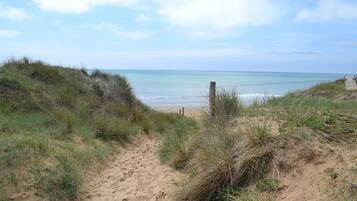 Plage, chaises longues