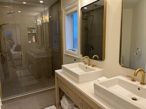 Shower, hair dryer, towels, soap