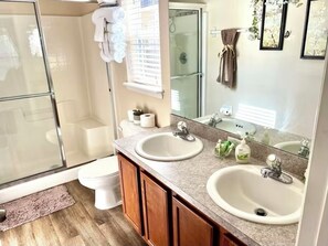Shower, hair dryer, towels, soap