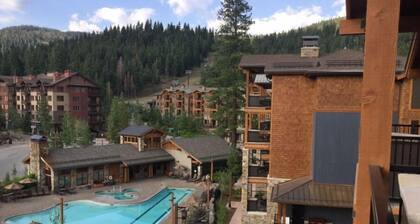 Surrounded by pine trees and mountains