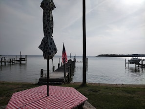 Enjoy a serene lakeside retreat with a dock, picnic area, and boat access.