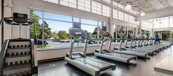 Sea Colony villa with deck, AC, multiple pools, hot tubs, gym, & sports courts