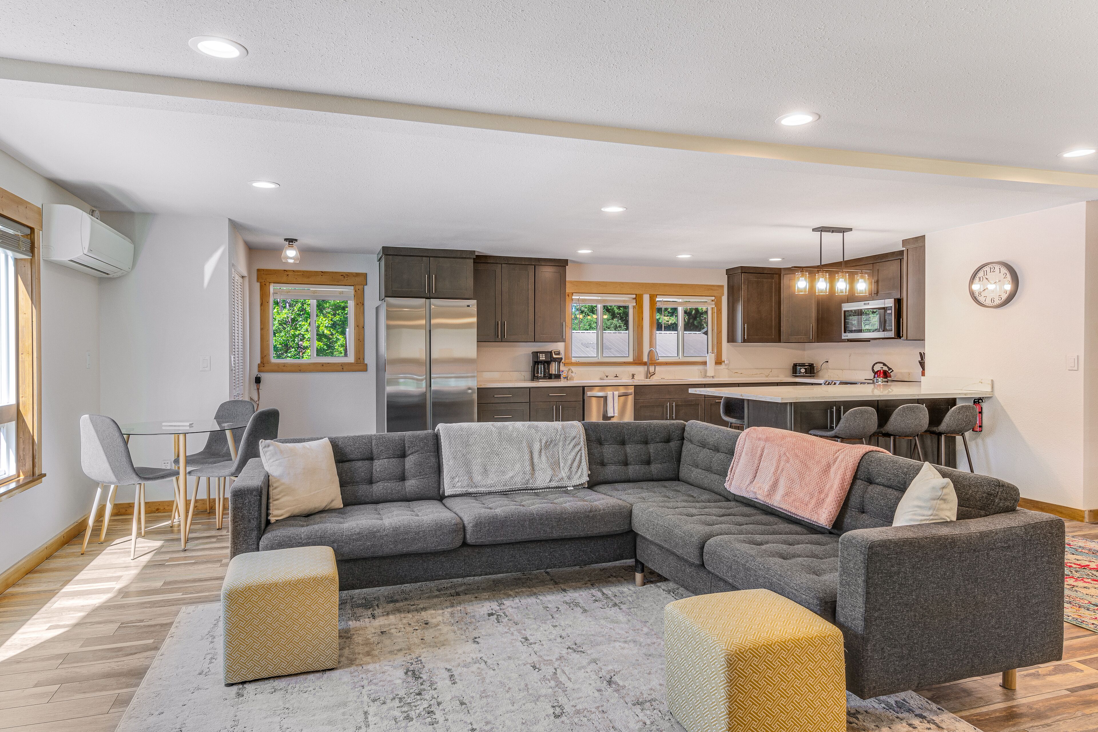 Two-story home near downtown with large deck, lawn, washer/dryer, enclosed yard