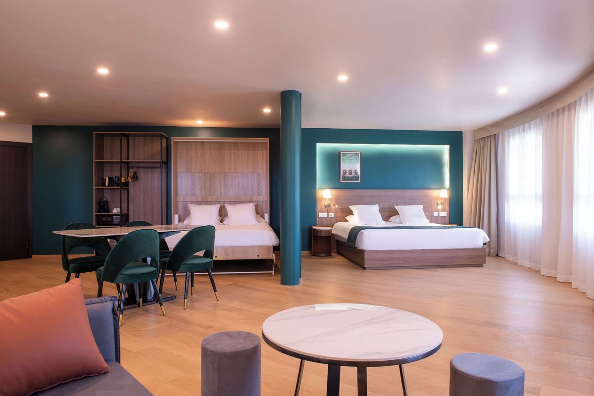 Suite, 2 Bedrooms | Desk, blackout curtains, soundproofing, iron/ironing board (on request)