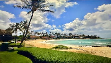 On the beach, sun loungers, beach towels