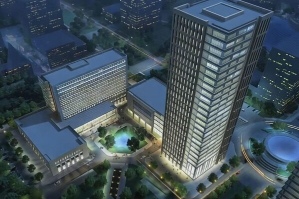 A high-rise building with a rooftop terrace and a circular plaza. - Mingdu Hotel (Zhenjiang)