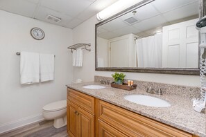 Combined shower/bathtub, hair dryer, towels, soap