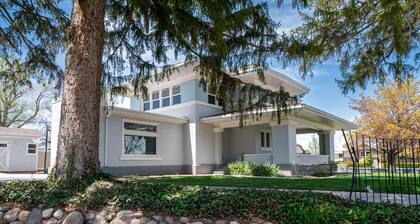 Charming Historic Home with chef's kitchen formal dining, sitting room, & patio