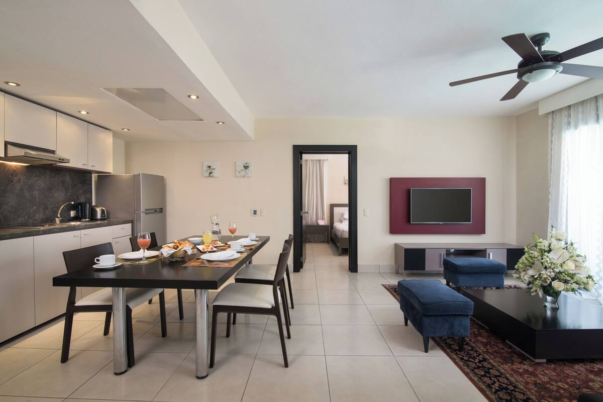 Luxury Apartment, 2 Bedrooms | Living area | 32-inch TV with satellite channels