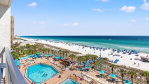 A resort with a pool, beach, and ocean view. - The Summit 712 (Panama City Beach)
