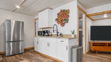 Fridge, microwave, stovetop, coffee/tea maker