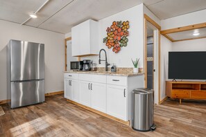 Fridge, microwave, stovetop, coffee/tea maker