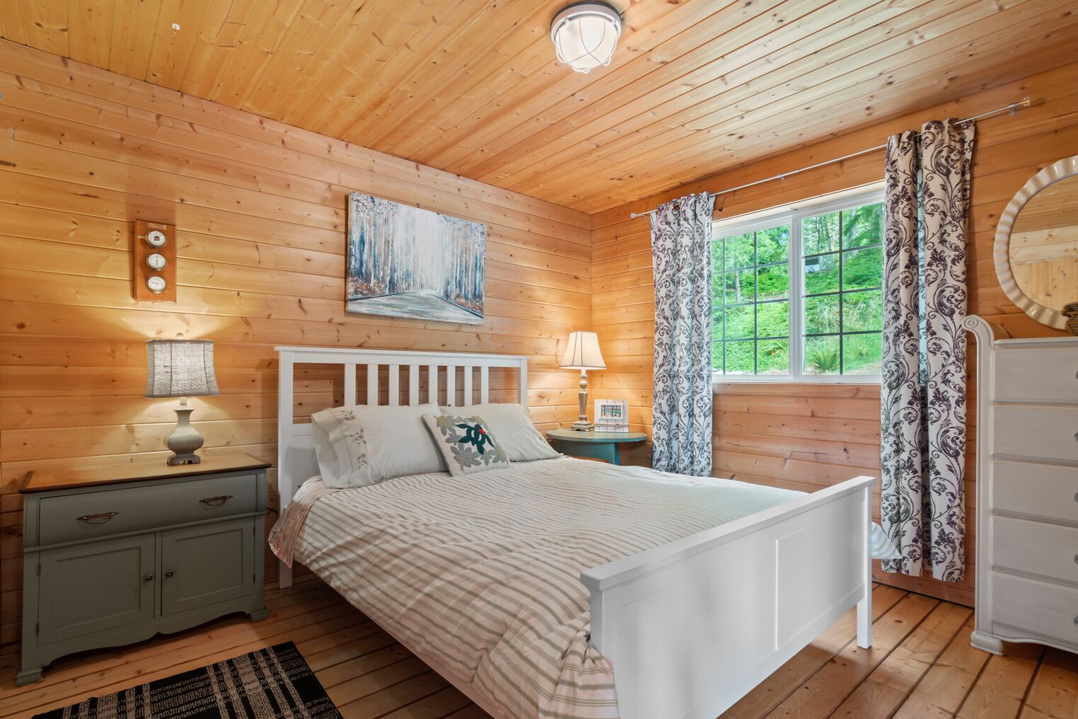 Waterfront, cabin- style home with breathtaking views of  Skookum Inlet.