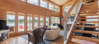 Waterfront, cabin- style home with breathtaking views of  Skookum Inlet.