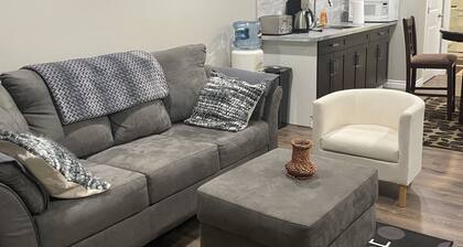 Tree facing back yard walkout unit at stony plain