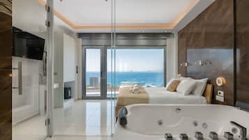 Shower, jetted bath, hair dryer, towels