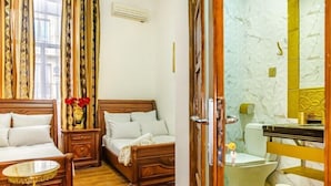 Habitación cuádruple clásica | Cortinas opacas y sistema de insonorización