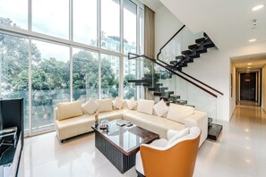 Luxury Villa, 4 Bedrooms, Private Pool | Living room | 50-inch flat-screen TV with cable channels, TV, smart speakers - Serenity Luxury Private Pool Villas - Free One Way Airport Shuttle (Ho Chi Minh City)