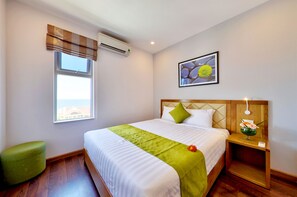 Premium bedding, pillow-top beds, minibar, individually decorated - Richico Luxury Apartel Ocean (Da Nang)