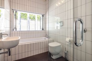 Shower, hair dryer, towels, shampoo