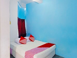 Economy Double Room | Bed sheets - Hotel O Rafika Homestay SyariahNearTempat Makan Pagi Sore Nohil (Batam)