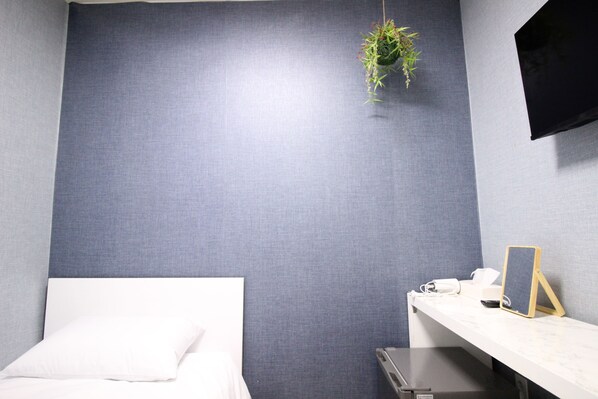 Eenvoudige eenpersoonskamer | Gratis wifi, beddengoed